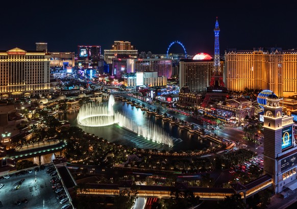 This high angle night view features traffic on Las Vegas Boulevard and many resorts on the Las Vegas Strip.