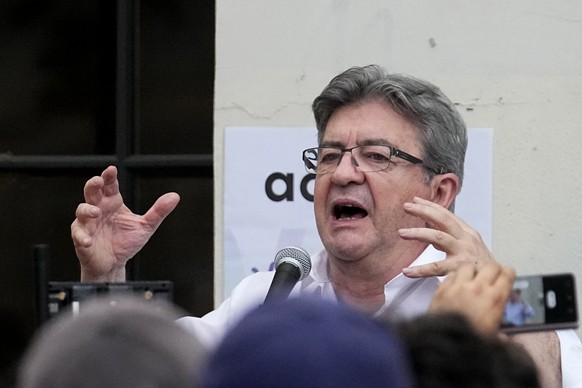 Hard-left leader Jean-Luc Melenchon speaks to supporters outside his election night headquarters, Sunday, June 19, 2022 in Paris. French President Emmanuel Macron&#039;s alliance got the most seats in ...