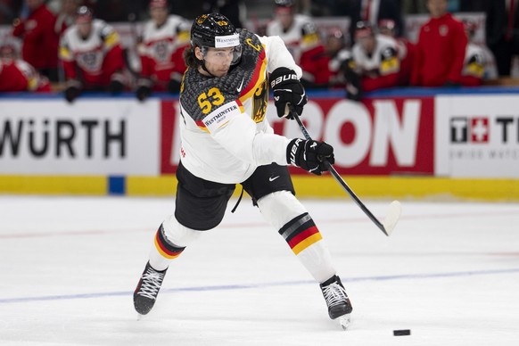 epa12988429 Germany's Moritz Seider in action during the 2026 IIHF Men's Ice Hockey World Championship preliminary round group A game between Austria and Germany, at the Swiss Life Arena ice ...