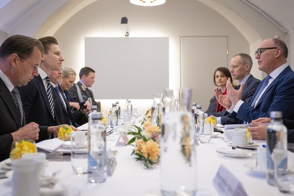 epa12845439 Finnish Minister of Defence Antti Hakkanen (2-L) and Swiss Federal Councillor and Minister of Defence Martin Pfister (R) during a bilateral meeting, in Helsinki, Finland, 24 March 2026. Pf ...