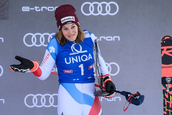 epa09659600 Second placed Michelle Gisin of Switzerland celebrates on the podium after the Women&#039;s Slalom race at the FIS Alpine Skiing World Cup event in Lienz, Austria, 29 Dezember 2021. EPA/CH ...