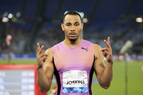Jason Joseph, of Switzerland, poses after winning the men 110 meters hurdles at the Diamond League Golden Gala Pietro Mennea athletics meet at the Stadio Olimpico in Rome, Friday, June 6, 2025. (AP Ph ...