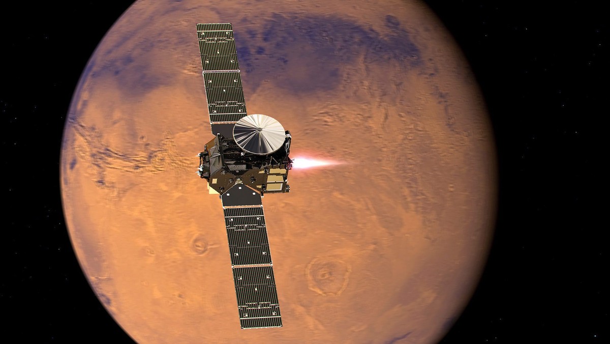epa05585538 A handout image released on 19 February 2016 by the European Space Agency (ESA) shows an artist's impression visualising the ExoMars 2016 Trace Gas Orbiter (TGO), with its thrusters f ...