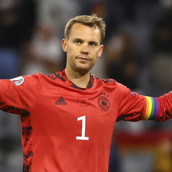 Germany&#039;s goalkeeper Manuel Neuer reacts after the Euro 2020 soccer championship group F match between Germany and Hungary in Munich, Wednesday, June 23, 2021.(Kai Pfaffenbach/Pool via AP)
