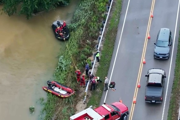 This image made from video provided by KTVI shows emergency workers handling flash flooding in Lesterville, Mo., Friday, July 10, 2026. (KTVI via AP)
Missouri Flooding