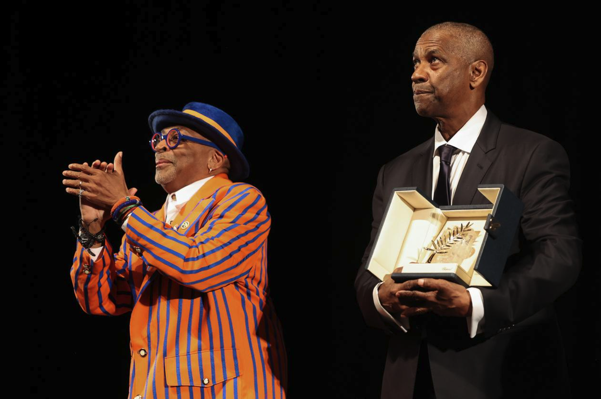 L'acteur Denzel Washington a reçu des mains du réalisateur Spike Lee une Palme d'or d'honneur surprise lundi soir à Cannes.