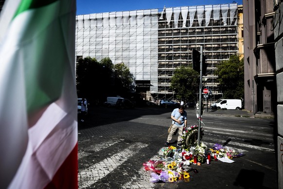 epa07743589 Notes and flowers have been placed at the site where Carabiniere police officer Mario Cerciello Rega was stabbed to death in Rome, Italy, 27 July 2019. A young US tourist has allegedly con ...