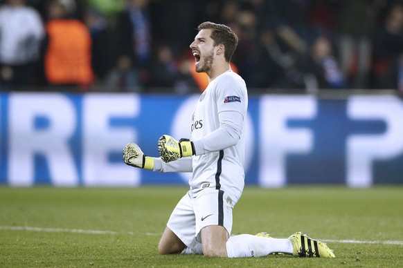 epa05793817 Paris Saint Germain goalkeeper Kevin Trapp celebrates a goal during the UEFA Champions League round of 16 first leg soccer match between Paris Saint Germain and FC Barcelona at the Parc de ...