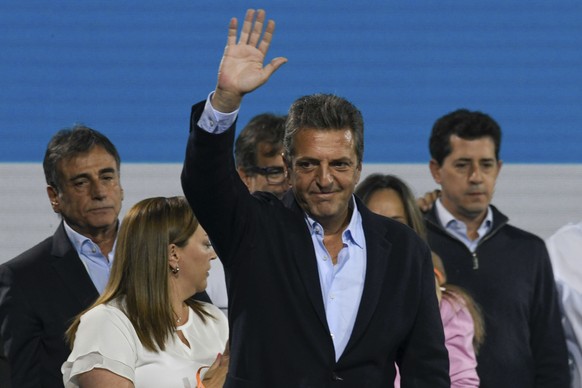 Argentina&#039;s Economy Minister Sergio Massa waves to supporters after conceding defeat to opposition candidate Javier Milei in the presidential runoff election in Buenos Aires, Argentina, Sunday, N ...