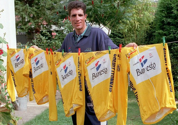 Spain (Espana): A file photo dated 22 July 1996 of Spanish five-time winner of Tour de France cyclist Miguel Indurain posing after his fifth Tour de France win with five yellow jerseys he won from 199 ...