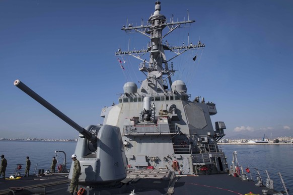 epa06661320 A handout photo made available by the US Navy on 10 April 2018 shows the Arleigh Burke-class guided-missile destroyer USS Donald Cook (DDG 75) departing Larnaca, on the southern coast of C ...