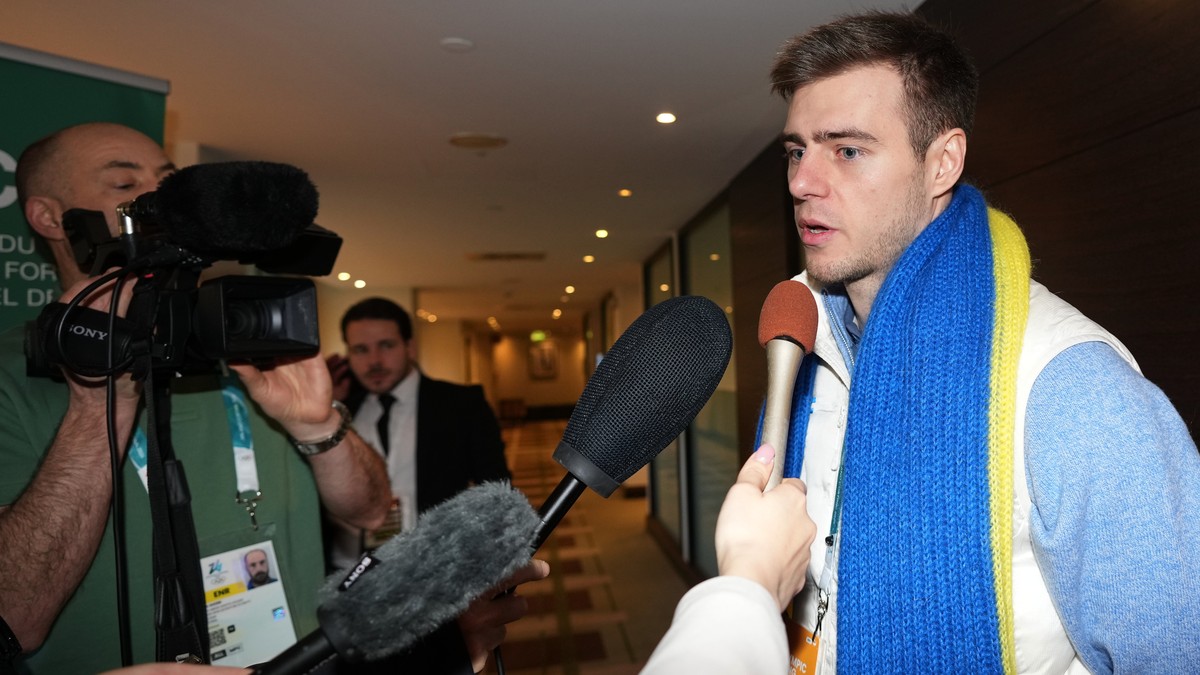 Ukrainian skeleton athlete Vladyslav Heraskevych speaks to the media as he arrives for a CAS appeal hearing in Milan, Italy, Friday, Feb. 13, 2026. (AP Photo/Antonio Calanni)
Vladyslav Heraskevych