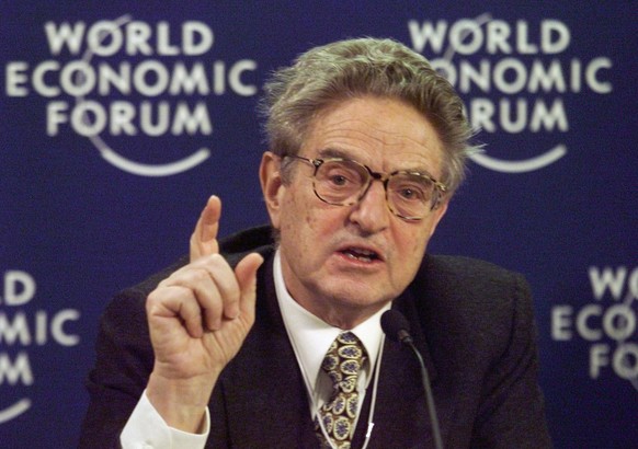 FILE - In this Monday, Feb. 1, 1999 file photo, U.S. financier George Soros speaks during a press conference at the World Economic Forum in Davos, Switzerland. The mail bomb that showed up in the mail ...