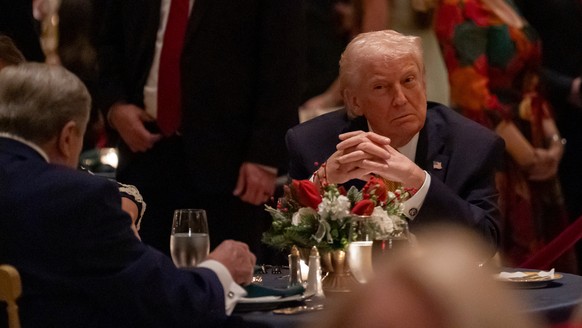 President Donald Trump sits during Christmas Eve dinner at his Mar-a-Lago club, Wednesday, Dec. 24, 2025, in Palm Beach, Fla. (AP Photo/Alex Brandon)
Donald Trump