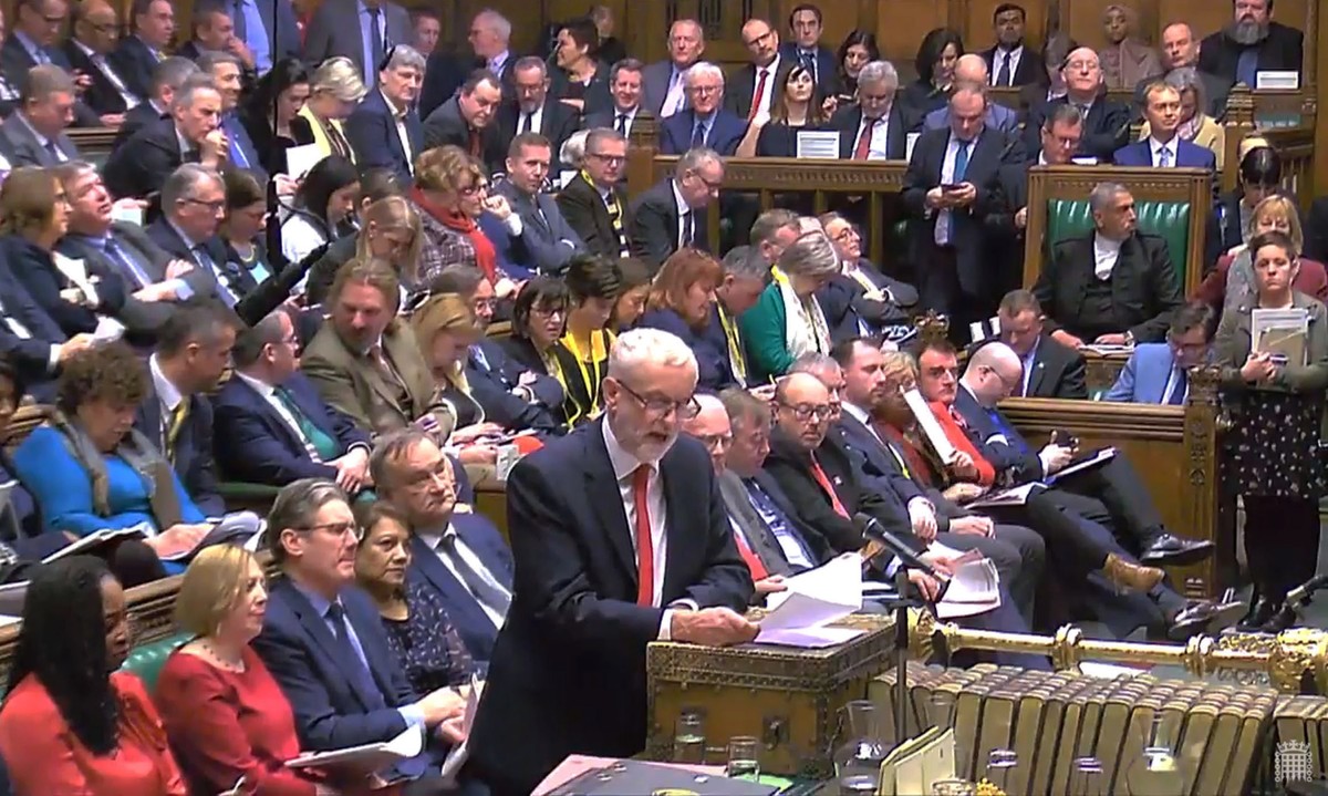 epa07289419 A handout video-grabbed still image from a video made available by UK parliament's parliamentary recording unit showing British opposition party Labour's leader Jeremy Corbyn (C) ...