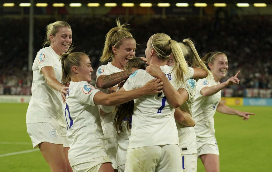 England's Francesca Kirby celebrates with teammates after scoring her side's 4th goal during the Women Euro 2022 semi final soccer match between England and Sweden at Bramall Lane Stadium in Sheffield ...