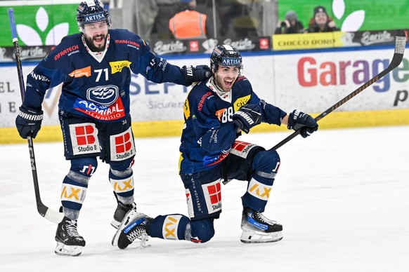 Tommaso De Luca (HCAP) right celebrates his goal with Jesse Virtanen (HCAP) left, during the regular season match of National League Swiss Championship 2024/25 between HC Ambri Piotta and HC Ajoie at  ...