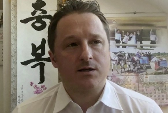 FILE - In this file image made from a March 2, 2017, video, Michael Spavor, director of Paektu Cultural Exchange, talks during a Skype interview in Yanji, China. The Canadian entrepreneur who was char ...