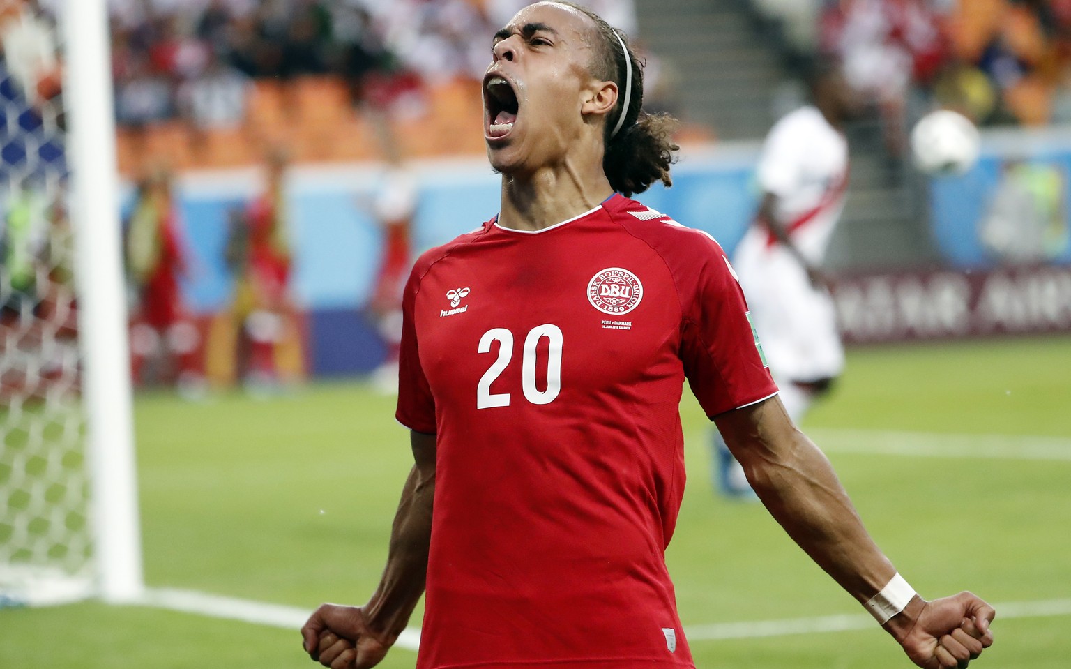 epaselect epa06814015 Yussuf Poulsen of Denmark celebrates scoring the 1-0 during the FIFA World Cup 2018 group C preliminary round soccer match between Peru and Denmark in Saransk, Russia, 16 June 20 ...