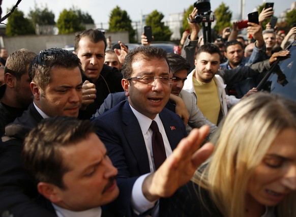 Ekrem Imamoglu, centre, of the opposition Republican People&#039;s Party (CHP) mayoral candidate in Istanbul, arrives to receive a certificate confirming his win by a slim margin against ruling party& ...