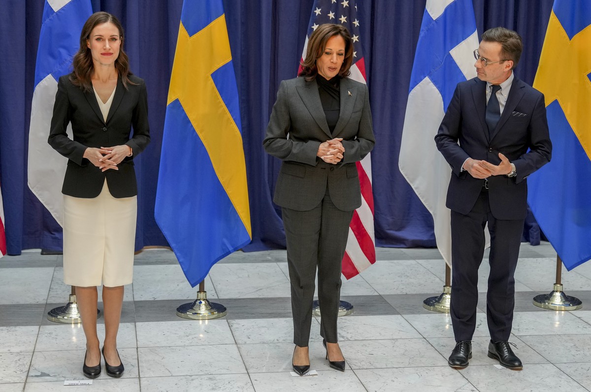 Finland's Prime Minister Sanna Marin, Vice President of the United States Kamala Harris and Sweden's Prime Minister Ulf Kristersson, from left, take their places to pose for a photo before t ...