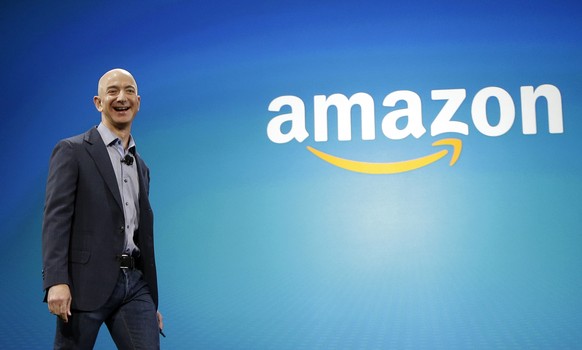 FILE - In this June 16, 2014, file photo, Amazon CEO Jeff Bezos walks onstage for the launch of the new Amazon Fire Phone, in Seattle. In a milestone announced Tuesday, March 6, 2018, Bezos has become ...