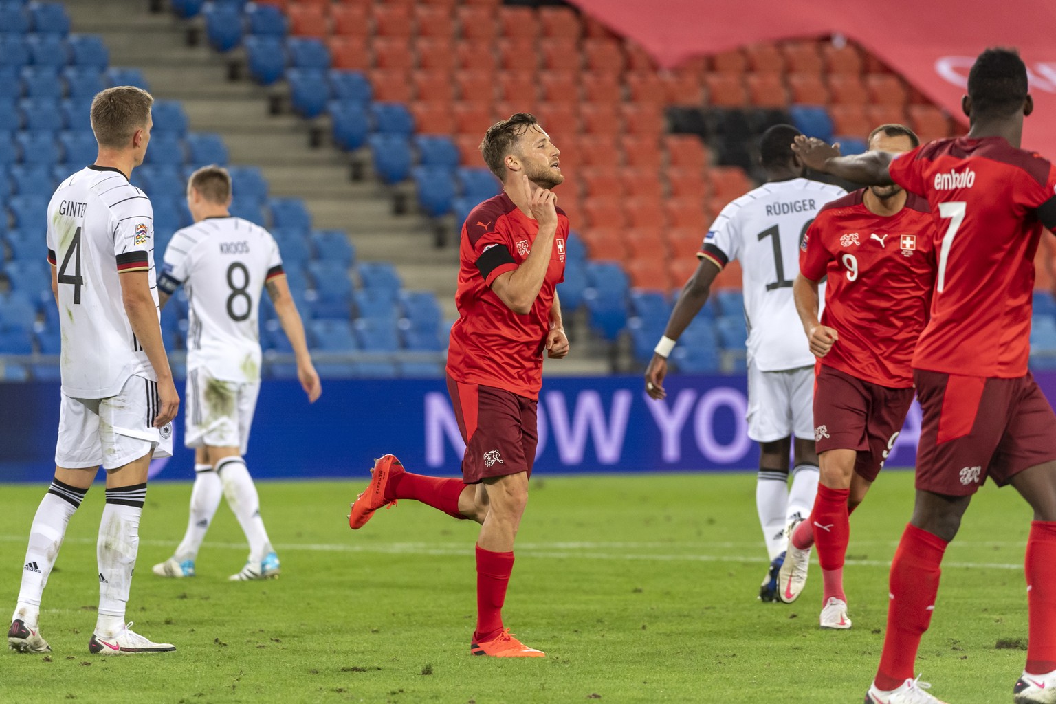 epa08651593 Switzerland&#039;s Silvan Widmer cheers after scoring during the UEFA Nations League group 4 soccer match between Switzerland and Germany at the St. Jakob-Park stadium in Basel, Switzerlan ...