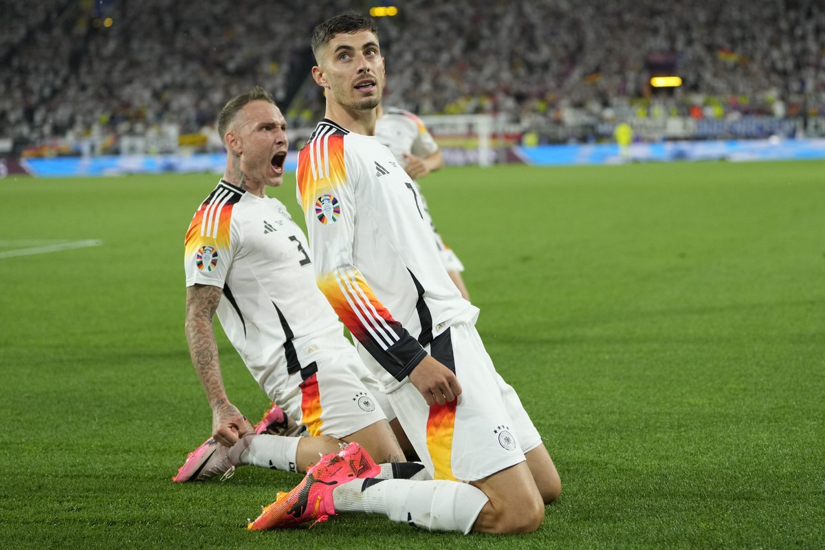 Germany's Kai Havertz celebrates after scoring his side's opening goal from a penalty kick during a round of sixteen match between Germany and Denmark at the Euro 2024 soccer tournament in D ...