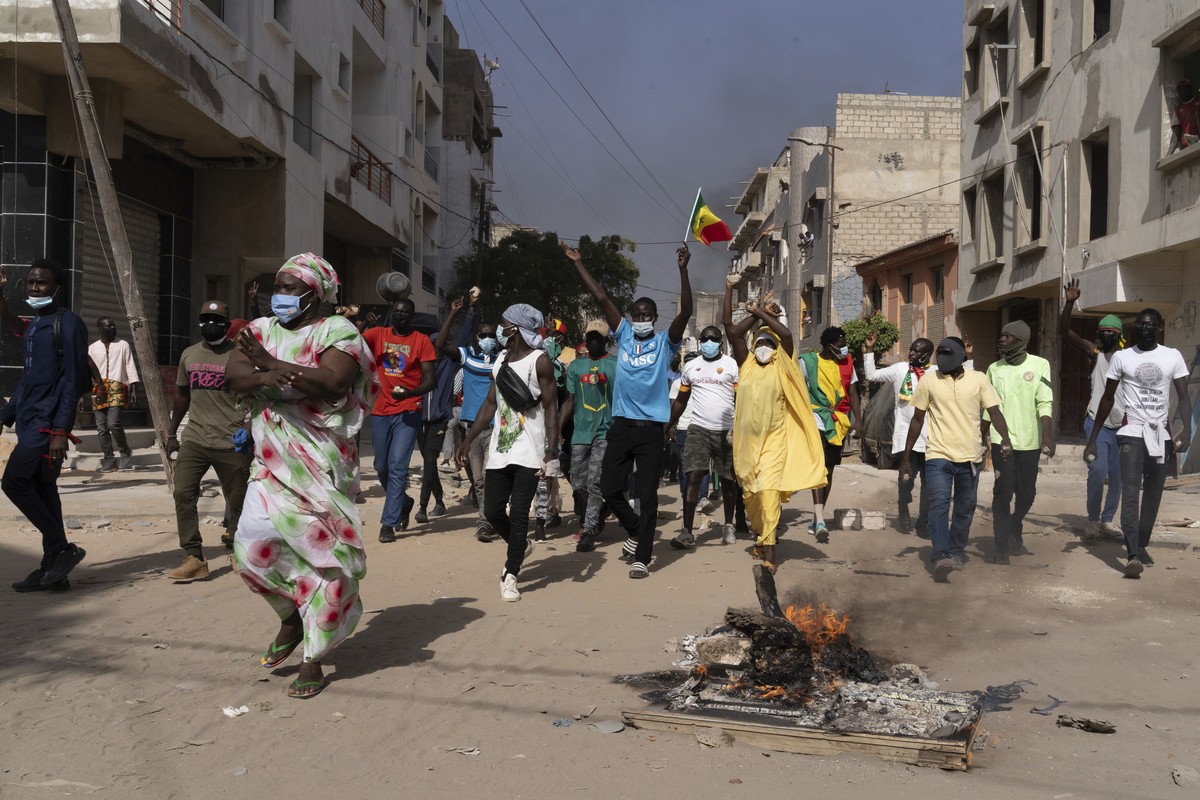 Demonstrators protest President Macky Sall decision to postpone the Feb. 25 vote, citing an electoral dispute between the parliament and the judiciary regarding some candidacies in Dakar, Senegal, Fri ...