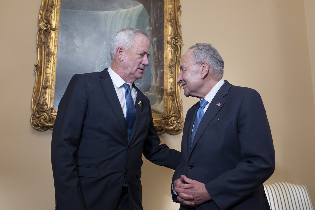 Benny Gantz, left, a key member of Israel's War Cabinet and the top political rival of Israeli Prime Minister Benjamin Netanyahu, is welcomed by Senate Majority Leader Chuck Schumer, for a privat ...