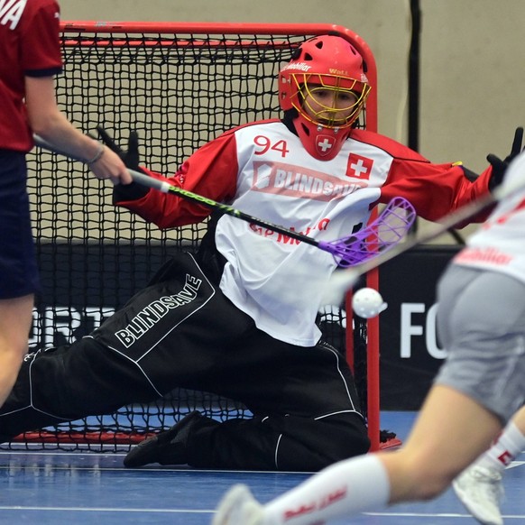 L-R Karolina Klubalova CZE and goalkeeper Lara Heini SUI in action during women s Euro Floorball Tour, match Czechia vs Switzerland, in Karlovy Vary, Czech Republic, on November 10, 2024. CTKxPhoto/Sl ...