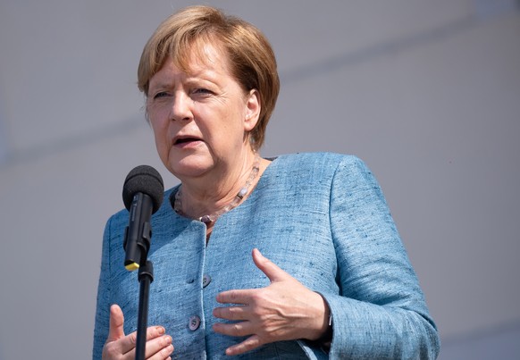 epa06994465 German Chancellor Angela Merkel during a press statement for the 9th Future Talks with social partners at the guesthouse of the Federal Government, Schloss Meseberg, in Berlin, Germany, 03 ...