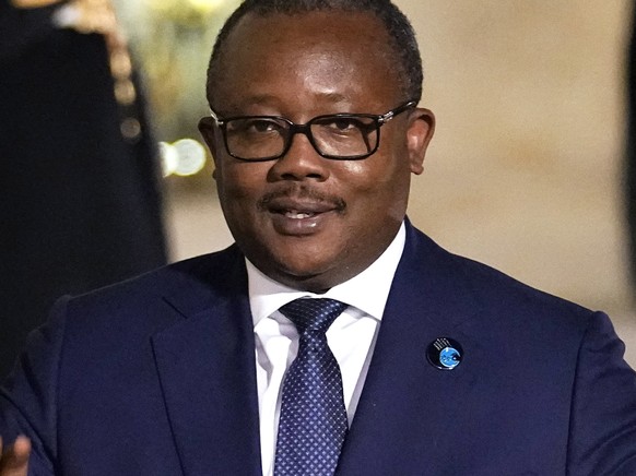 FILE - President of Guinea-Bissau Umaro Sissoco Embalo arrives for a dinner at the Elysee Palace as part of the Paris Peace Forum, in Paris, Nov. 11, 2021. Heavy gunfire erupted Tuesday Feb. 1, 2022 n ...