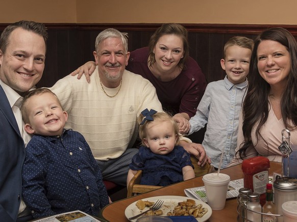 This photo provided by the family shows from left, David Bennett Jr., Preston Bennett, David Bennett Sr., Gillian Bennett, Nicole (Bennett) McCray, Sawyer Bennett, Kristi Bennett in 2019. In a medical ...