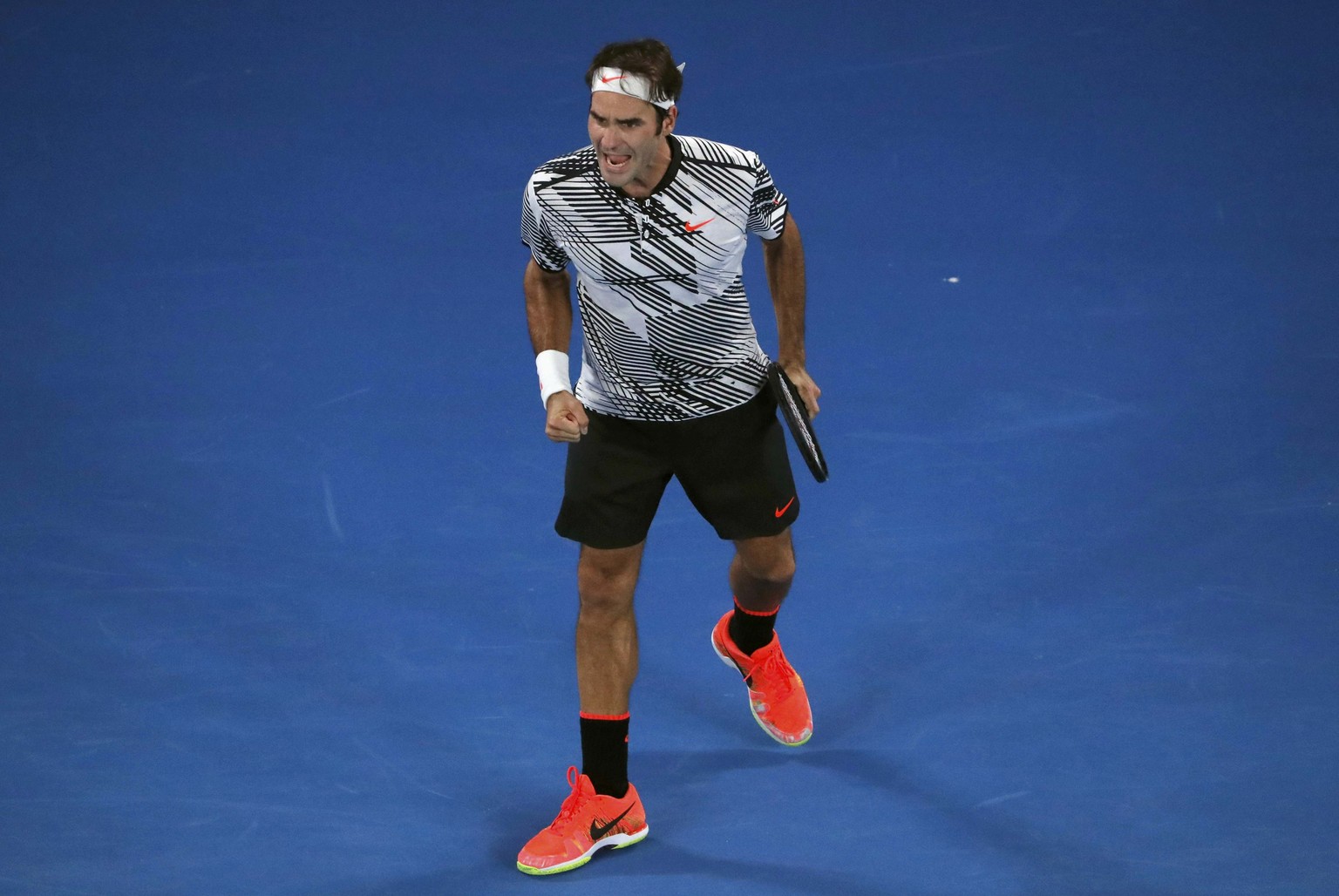 Tennis - Australian Open - Melbourne Park, Melbourne, Australia - 22/1/17 Switzerland&#039;s Roger Federer reacts during his Men&#039;s singles fourth round match against Japan&#039;s Kei Nishikori. R ...