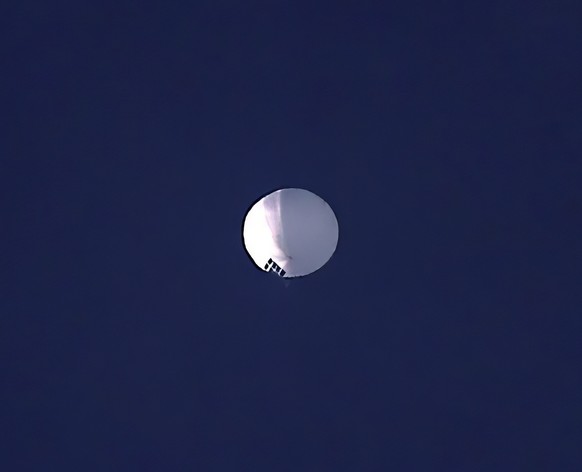 A high altitude balloon floats over Billings, Mont., on Wednesday, Feb. 1, 2023. The U.S. is tracking a suspected Chinese surveillance balloon that has been spotted over U.S. airspace for a couple day ...