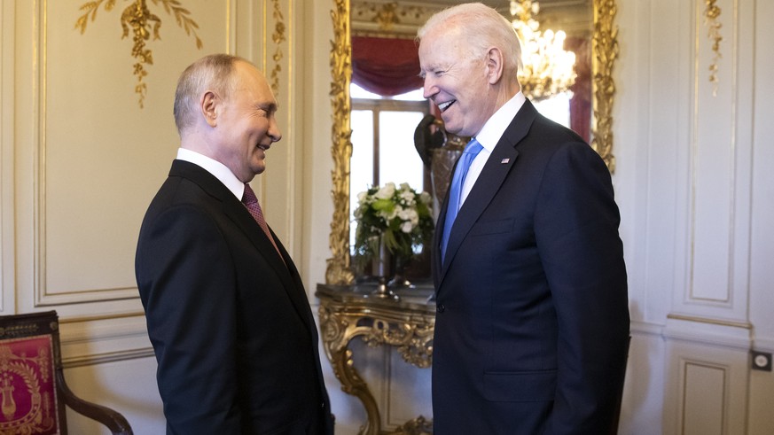 Russian president Vladimir Putin, left, talks with U.S. President Joe Biden, right, during the U.S. - Russia summit in Geneva, Switzerland, Wednesday, June 16, 2021. (Peter Klaunzer/Swiss Federal Offi ...