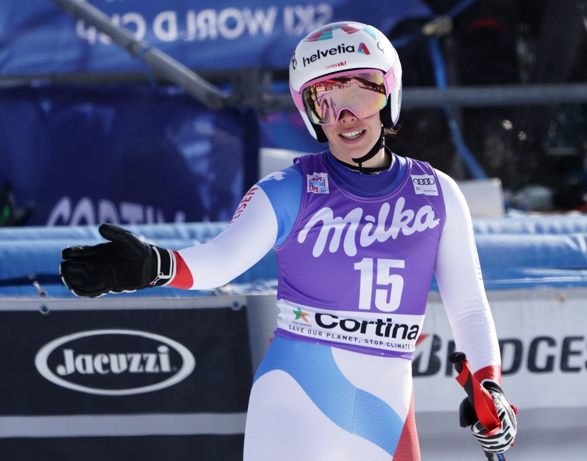 Switzerland's Michelle Gisin reacts at the finish area of an alpine ski, women's World Cup downhill in Cortina D'Ampezzo, Italy, Saturday, Jan. 19, 2019. (AP Photo/Giovanni Auletta)
