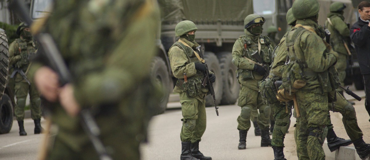 epa04104853 Unidentified armed men in military uniform block a Ukrainian military base in Balaklava, Crimea, Ukraine, 01 March 2014. New elected Crimea's Prime The armed men, described by Interio ...