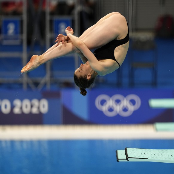 Michelle Heimberg of Switzerland competes in women&#039;s diving 3m springboard semifinal at the Tokyo Aquatics Centre at the 2020 Summer Olympics, Saturday, July 31, 2021, in Tokyo, Japan. (AP Photo/ ...