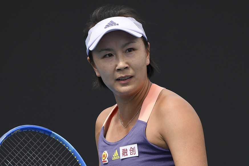 FILE - China&#039;s Peng Shuai reacts during her first round singles match against Japan&#039;s Nao Hibino at the Australian Open tennis championship in Melbourne, Australia on Jan. 21, 2020. Chinese  ...