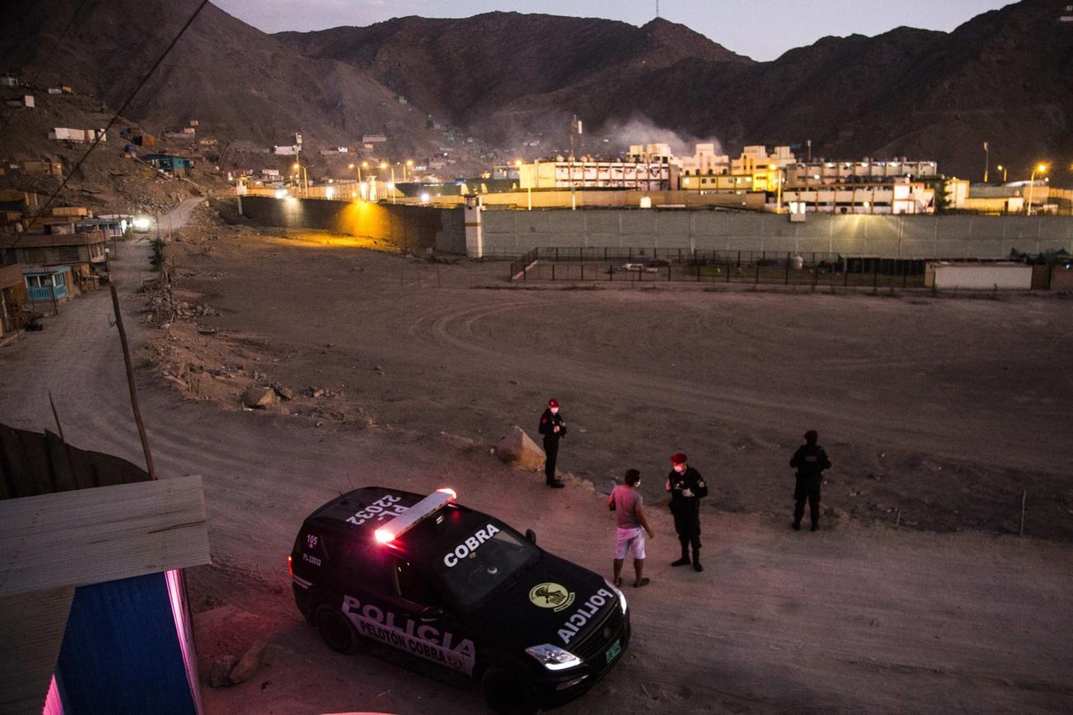 epa08389912 View of the Miguel Castro prison during a riot that broke out due to lack of resources to avoid the spread of COVID-19, east of Lima, Peru, 27 April 2020 (Issued 28 April 2020). The riot l ...