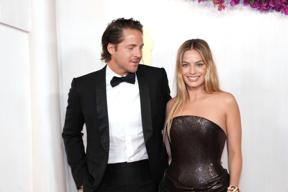 HOLLYWOOD, CALIFORNIA - MARCH 10: Tom Ackerley and Margot Robbie attend the 96th Annual Academy Awards at Dolby Theatre on March 10, 2024 in Hollywood, California. (Photo by Jeff Kravitz/FilmMagic)