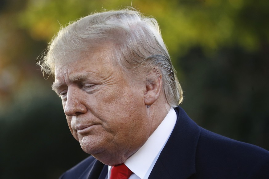 President Donald Trump speaks to members of the media on the South Lawn of the White House in Washington, Monday, Nov. 4, 2019, before boarding Marine One for a short trip to Andrews Air Force Base, M ...