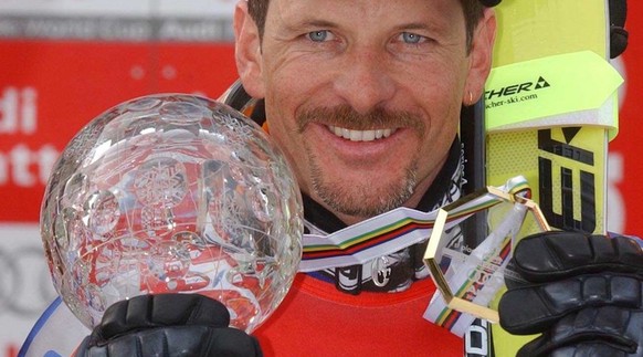 Swiss skier Michael von Gruenigen with the overall Giant Slalom World Cup trophy, after the last race at in Hafjell, Saturday 15 March 2003. (KEYSTONE/EPA PHOTO SCANPIX/CORNELIUS POPPE)