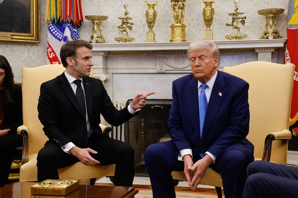 epa11922340 US President Donald Trump (R) meets with French President Emmanuel Macron (L) at the Oval Office of the White House in Washington, DC, USA, 24 February 2025. EPA/LUDOVIC MARIN / POOL