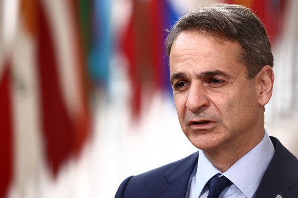 epa10456097 Greece&#039;s Prime Minister Kyriakos Mitsotakis speaks to the media as he arrives for a special meeting of the European Council in Brussels, Belgium, 09 February 2023. EU leaders will mee ...