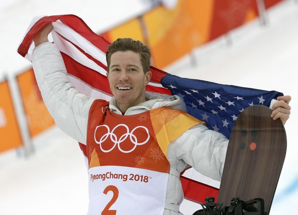 FILE - In this Feb. 14, 2018, file photo, gold medal winner Shaun White celebrates after the men&#039;s halfpipe finals at the 2018 Winter Olympics in Pyeongchang, South Korea. With the mountains clos ...