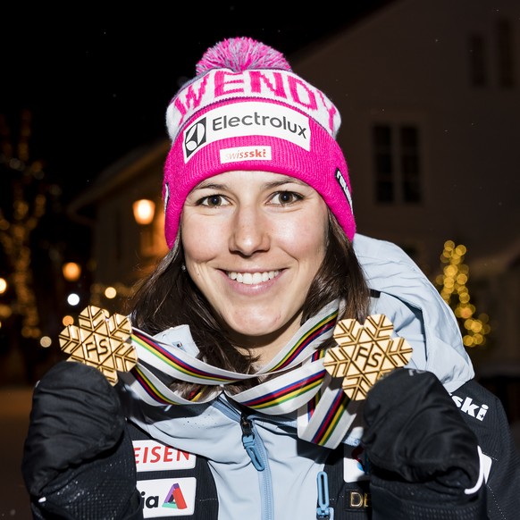Wendy Holdener of Switzerland poses with the gold medal for the Team Event and the gold medal for the Alpine Combined after the Alpine Team Event at the 2019 FIS Alpine Skiing World Championships in A ...