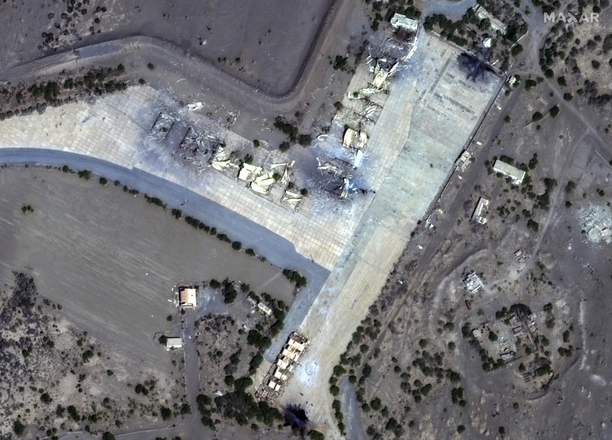 This Friday, Jan. 12, 2024 satellite image provided by Maxar Technologies shows an overview of destroyed shelters at Hudaydah aiirfield in Yemen. Yemen?s Houthi rebels have vowed fierce retaliation fo ...